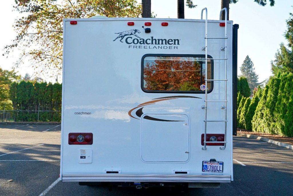 low miles and loaded 2013 Coachmen Freelander 21QB camper
