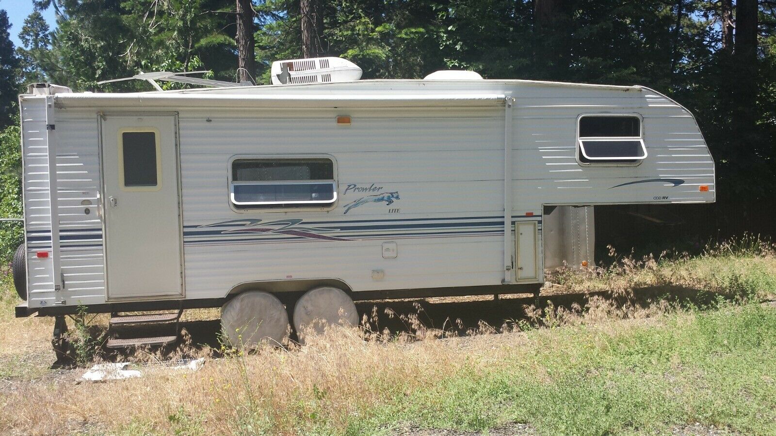 solid 2000 Fleetwood Prowler lite camper for sale