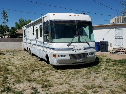 well equipped 1998 National Tropi Cal 6350 camper for sale