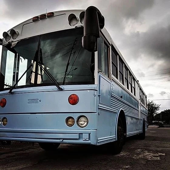 2002 Thomas Skoolie Tiny Home Conversion – Cozy Off-Grid Bus Cabin