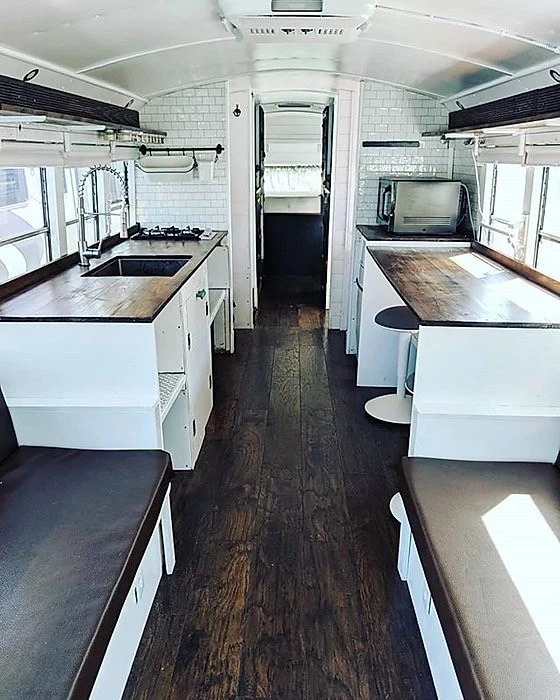 2002 Thomas Skoolie Tiny Home Conversion – Cozy Off-Grid Bus Cabin